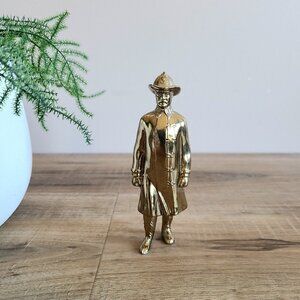Vintage solid brass Fireman sculpture statue. Historic realistic figurine.